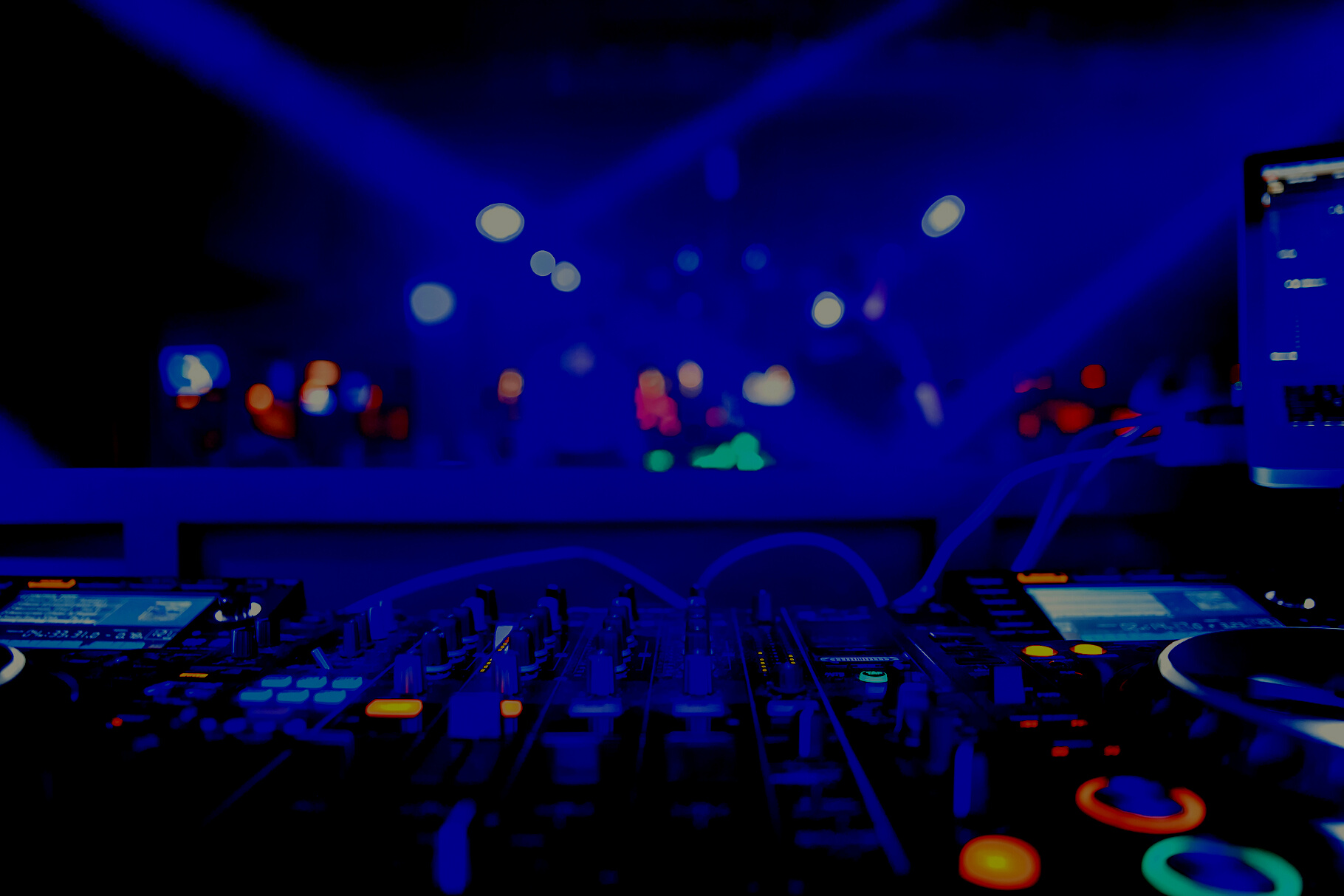 DJ playing music on light background